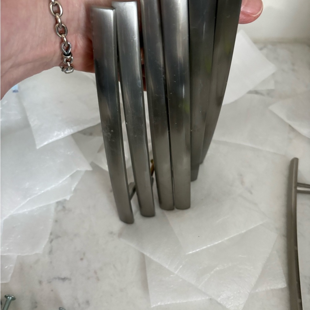7   Brushed nickel 7” pulls with 5” spread